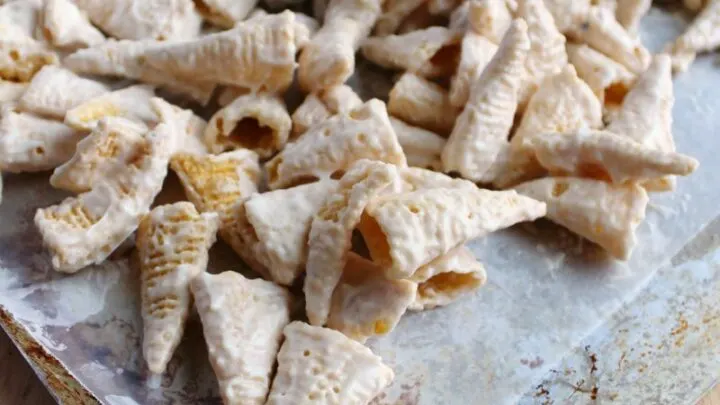 white chocolate coated bugles on wax paper