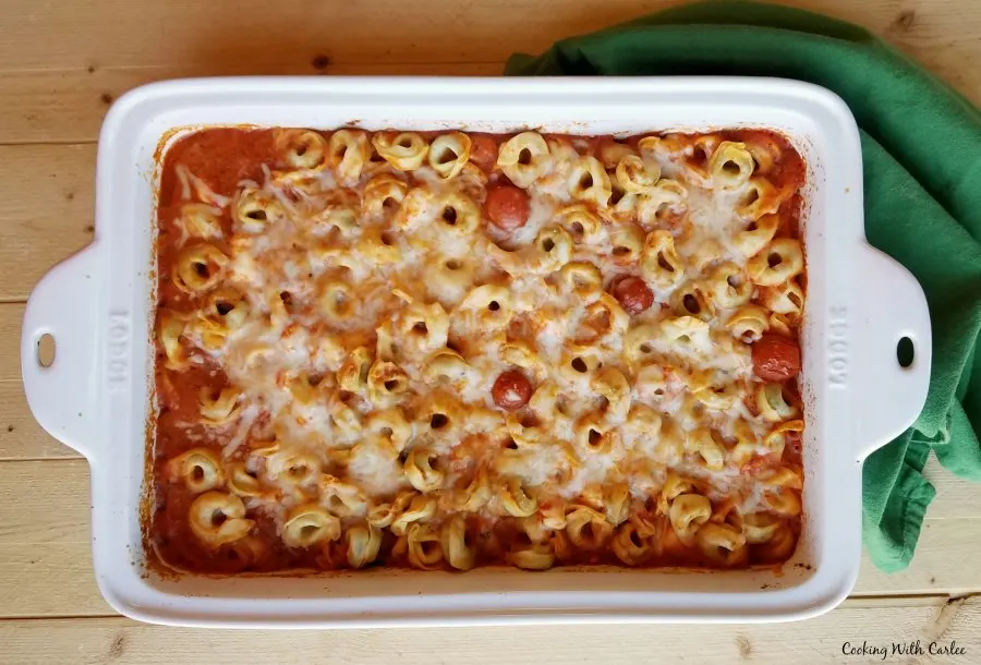 baked tortellini casserole with melted cheese on top.