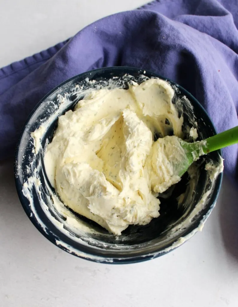 bowl of cream cheese ranch mixture ready to spread over slices of bread.