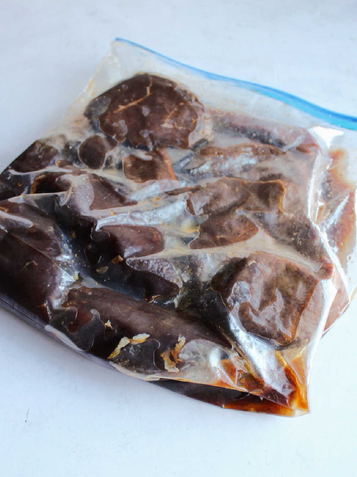 Zipper bag filled with venison backstrap chunks and korean bbq style marinade.