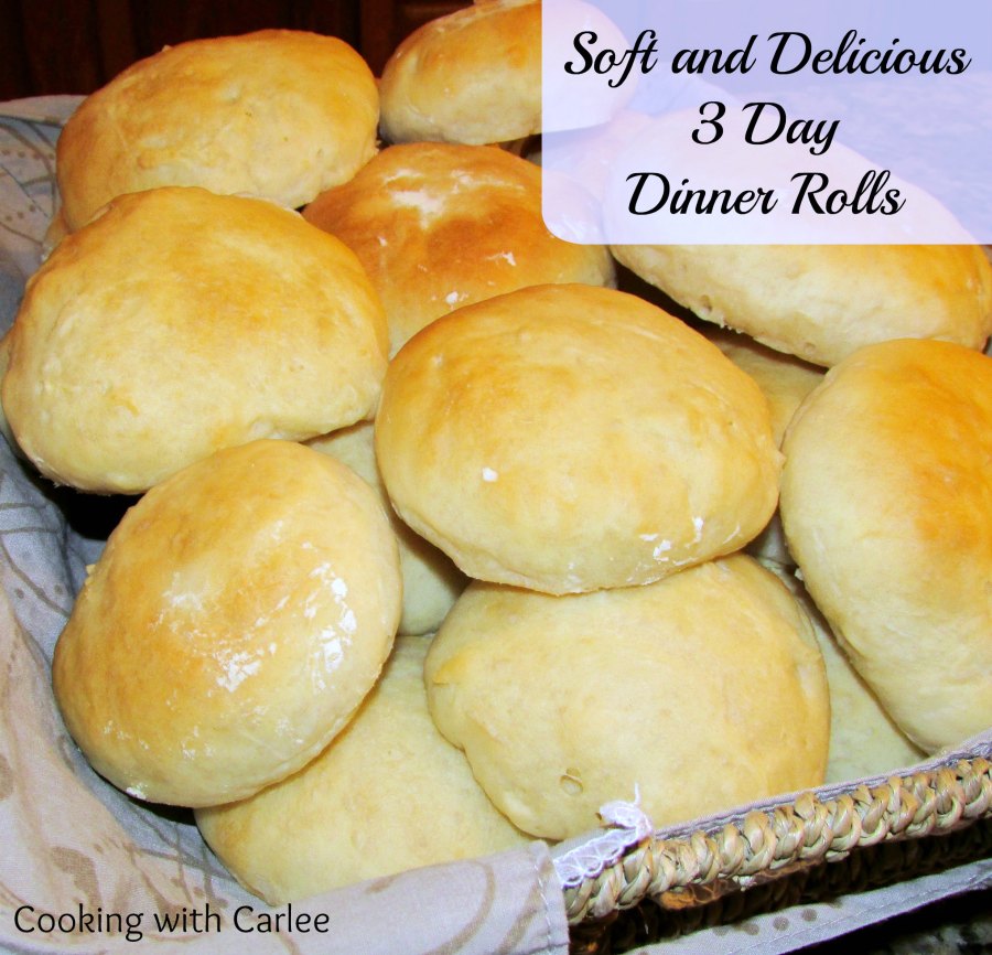 Basket of soft golden dinner rolls.