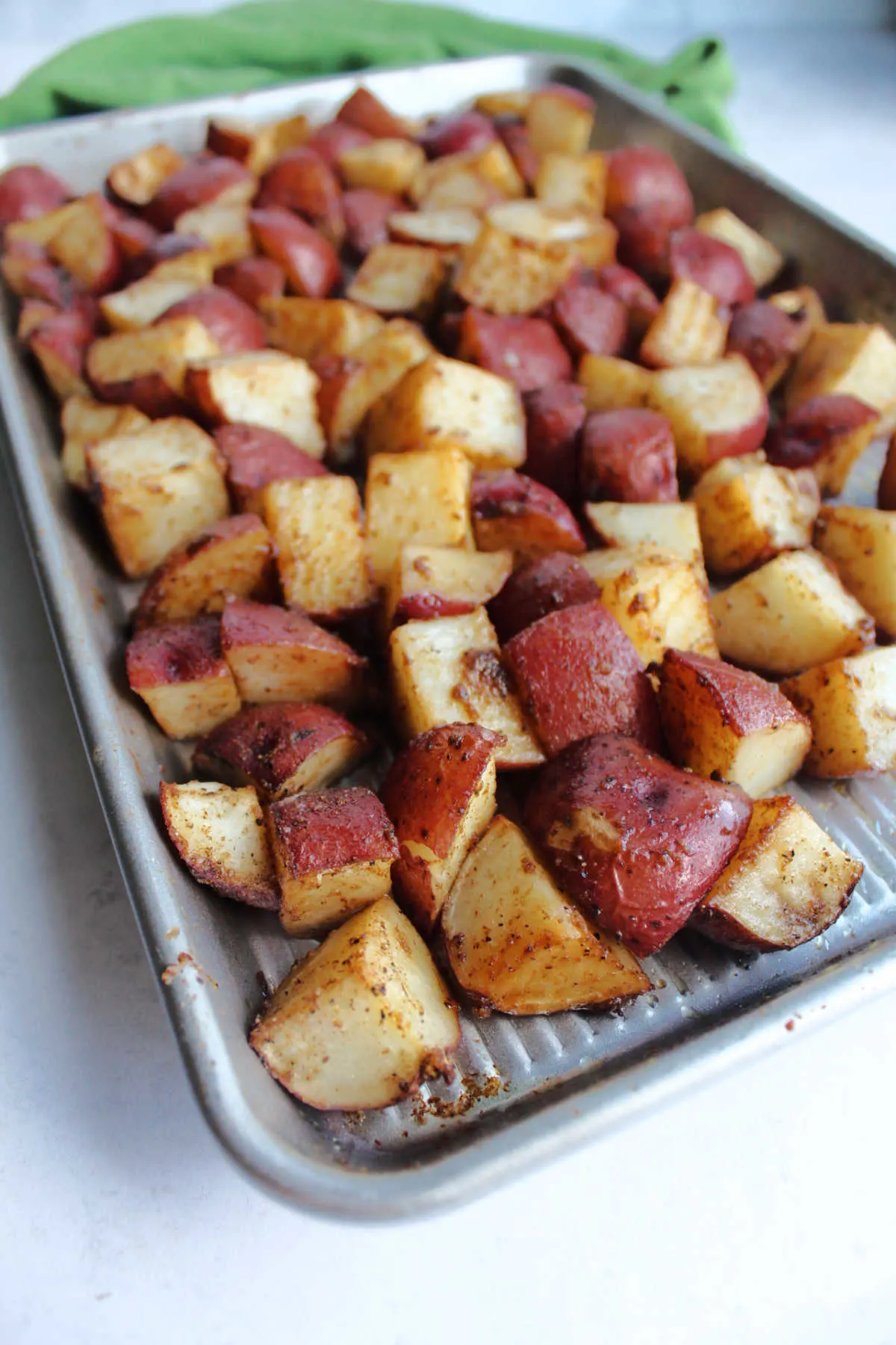 Tray of roasted potatoes fresh from the oven.