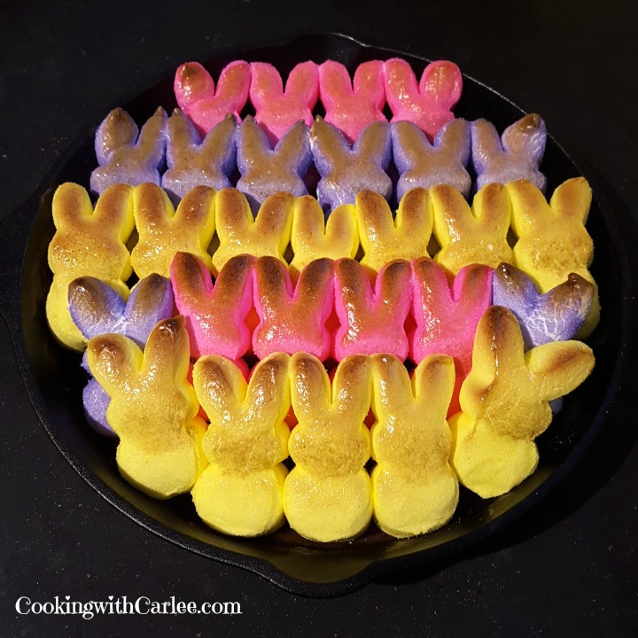 golden brown peeps bunnies on top of melted chocolate fresh from the oven