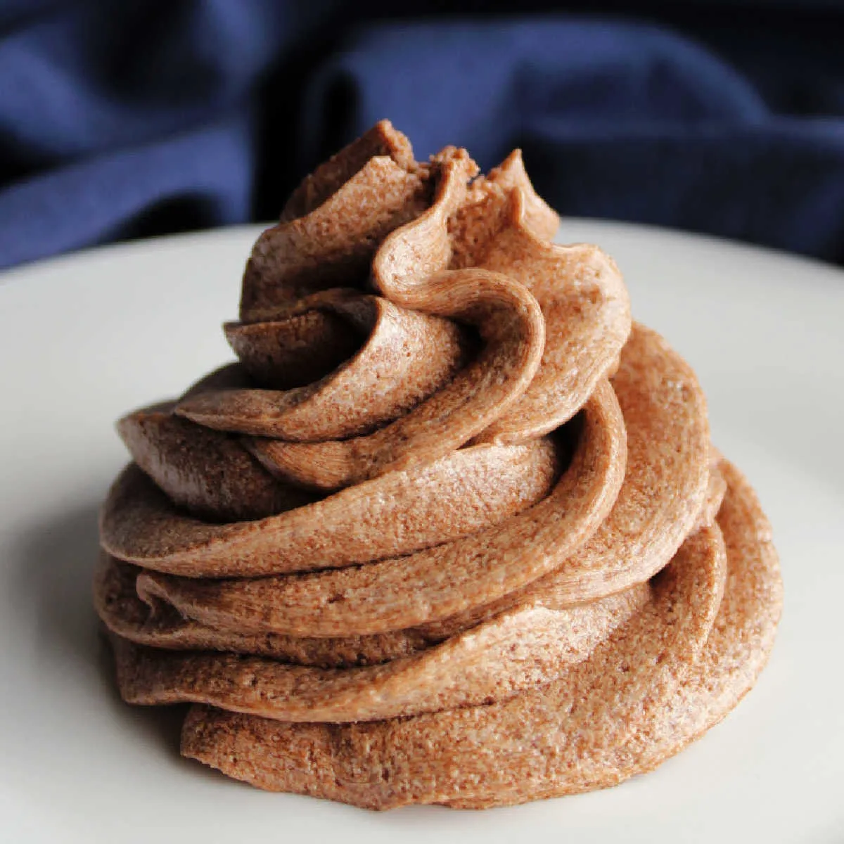 Pipe swirl of fluffy brown ermine frosting flavored with chocolate and coffee.