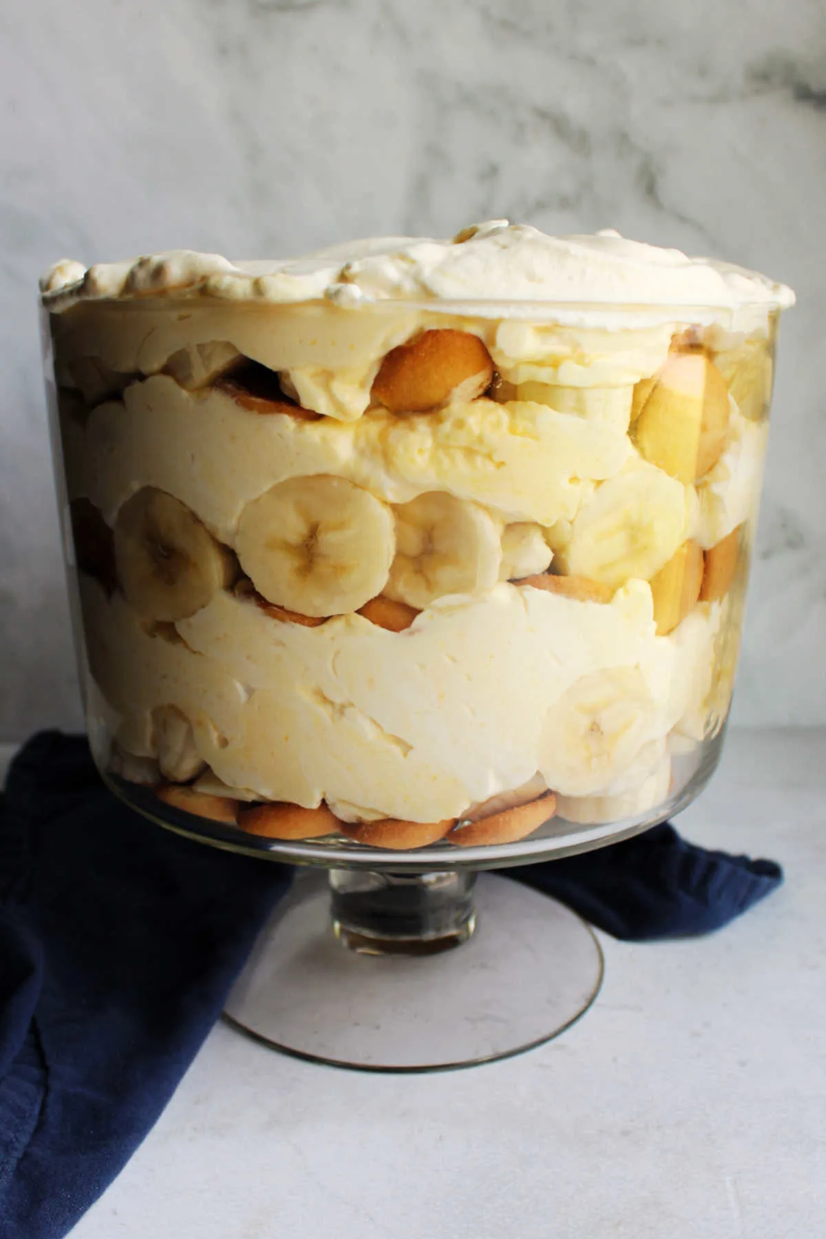 Trifle bowl filled with layered southern style banana pudding.