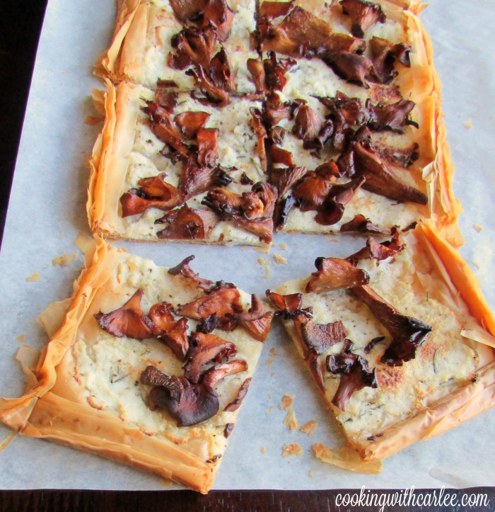 Phyllo tart with herbed ricotta cheese and sauteed chanterelle mushrooms.