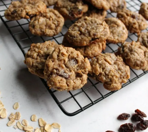 cinnamon oatmeal cookies with raisins on cooling rack