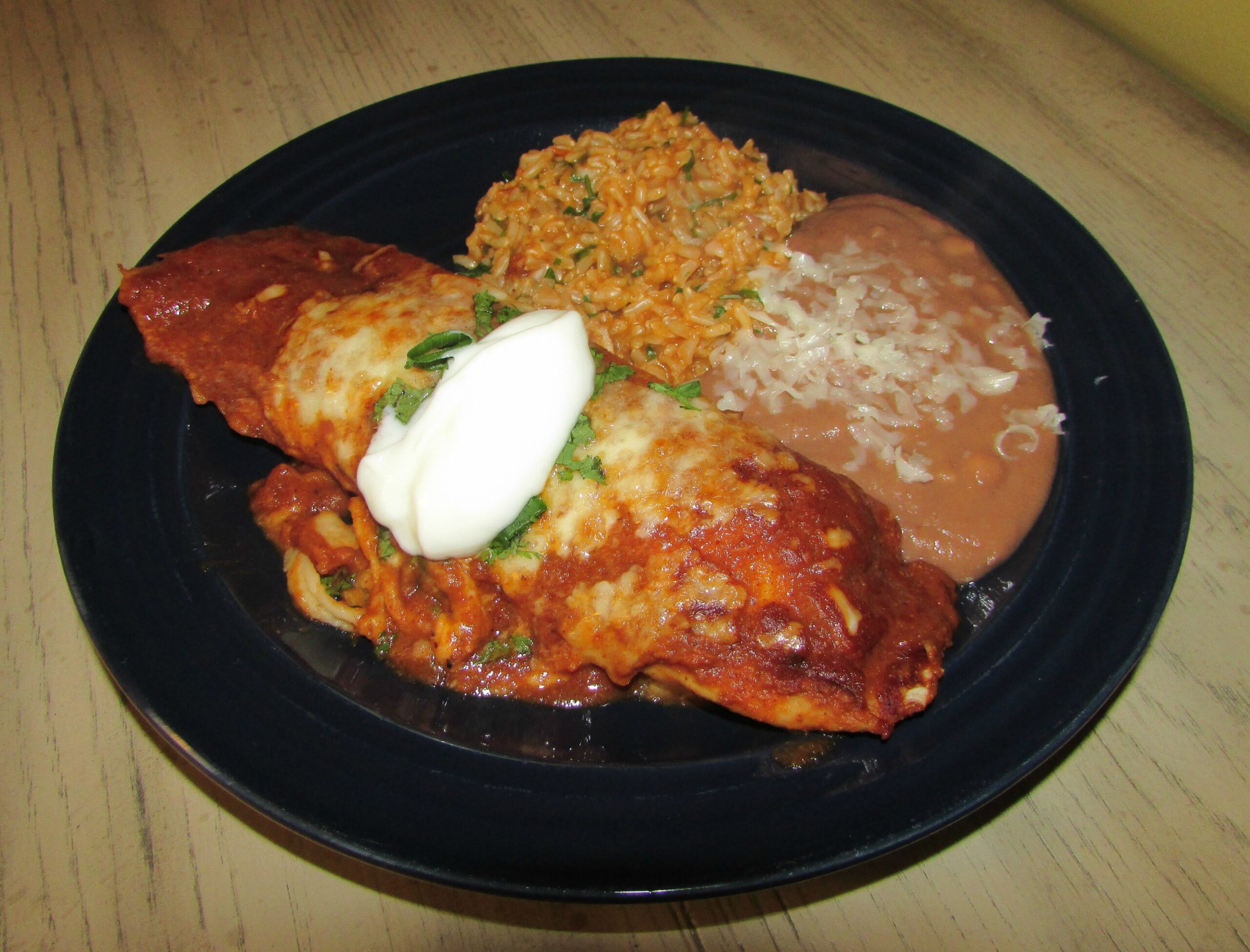 Chicken enchilada dinner, ready to eat.