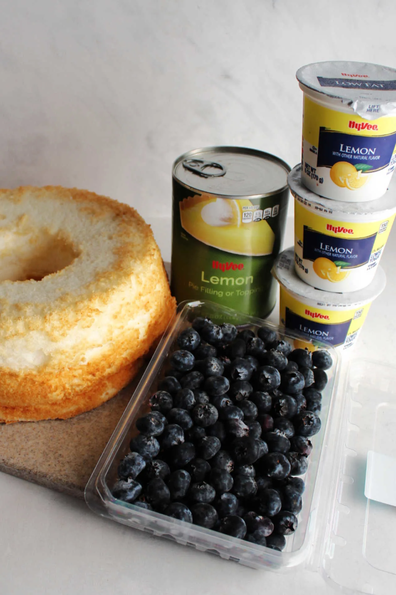 Ingredients: angel food cake, blueberries, can of lemon pie filling and lemon yogurts ready to be made into parfaits. 