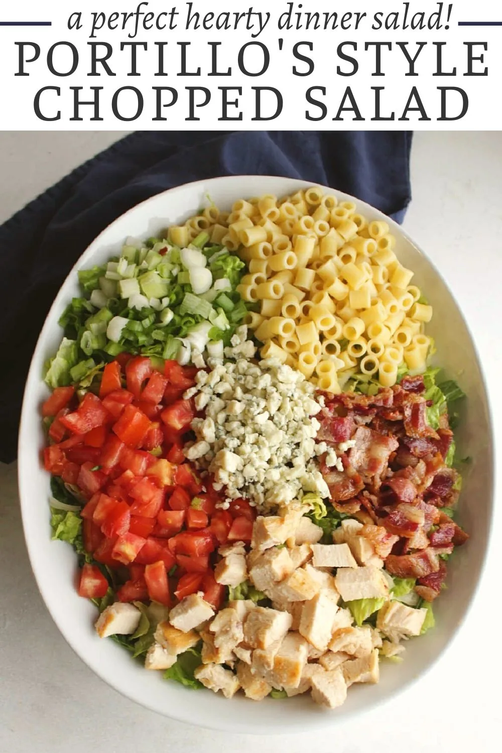 This Portillo's style chopped salad is a lot like what you would get at the restaurant. It is hearty and full of flavor. With bacon, chicken, pasta, tomatoes, and cheese it is sure to win you over.