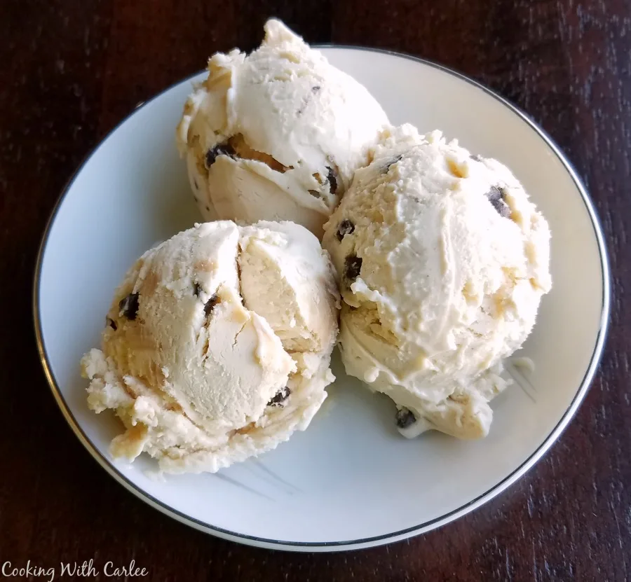 small bowl with three scoops of peanut butter chip ice cream.