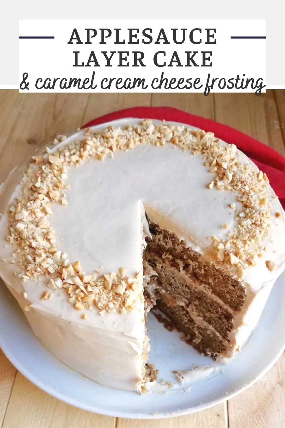 Slightly spiced and super moist applesauce layer cake goes perfectly with a soft and luscious caramel cream cheese frosting.  This cake is stunning and is perfect for fall gatherings.