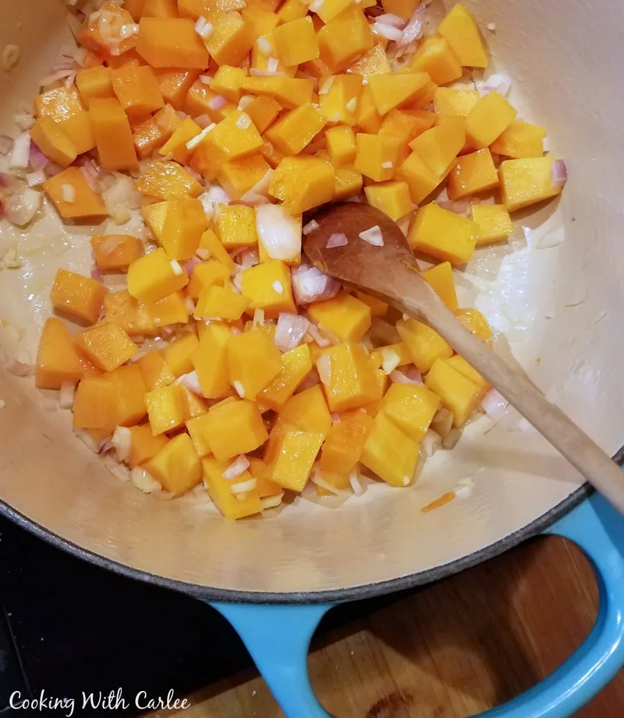 butternut squash and shallots being cooked for risotto.