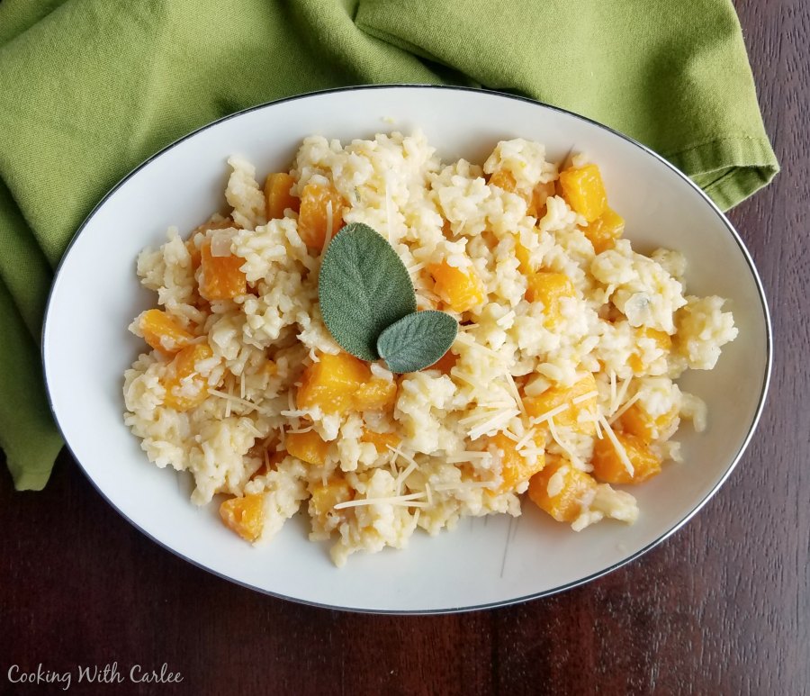 bowl of creamy risotto with cubes of butternut squash.