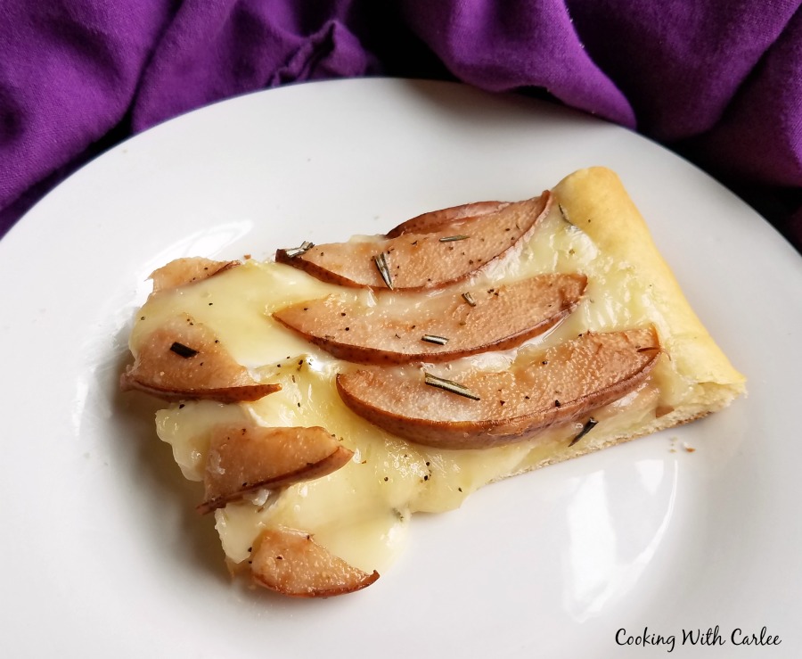 piece of flatbread with melted brie and slices of pear.