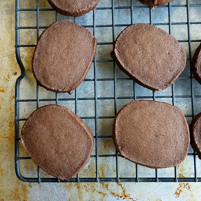 chocolate mocha shortbread cookies cooling on wire rack.
