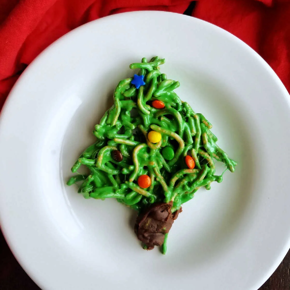 no bake christmas tree cookie made from chow mein noodles and candy.