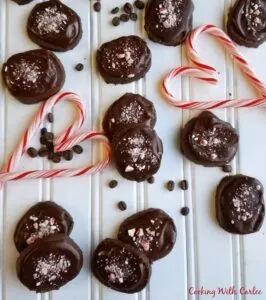 chocolate and peppermint topped mocha shortbread cookies, coffee beans and candy cane hearts.