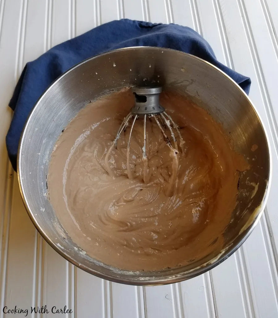 mixer bowl filled with creamy chocolate pie filling.