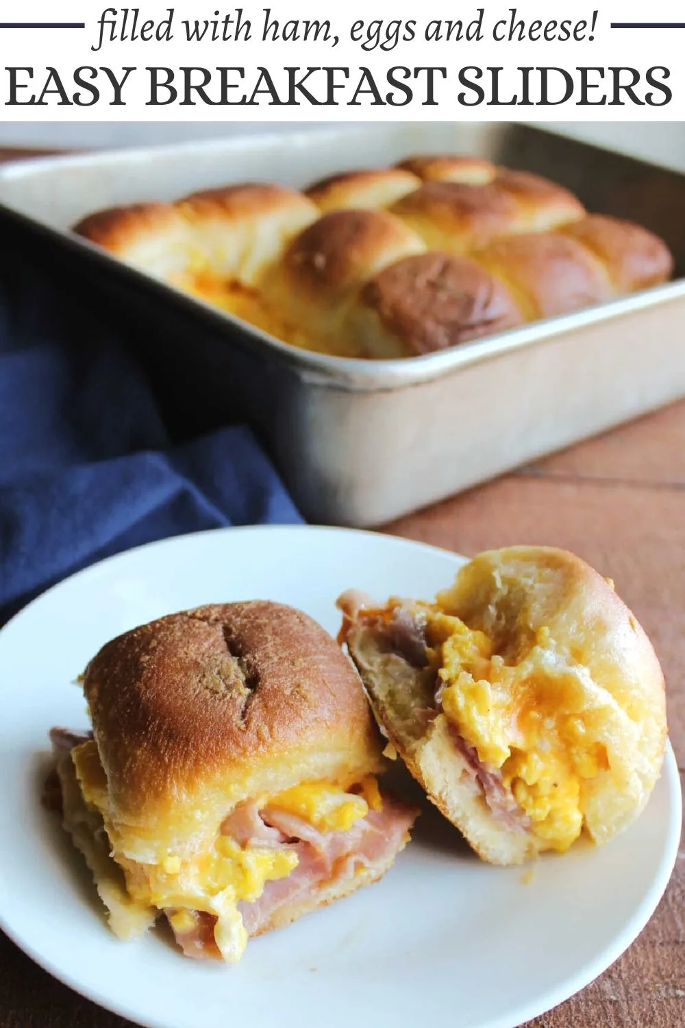 These simple ham, egg and cheese sliders are perfect for any meal, but they make a great make ahead breakfast. Scrambled eggs, ham, cheese and rolls come together to make a great hand held meal that the whole family will love.