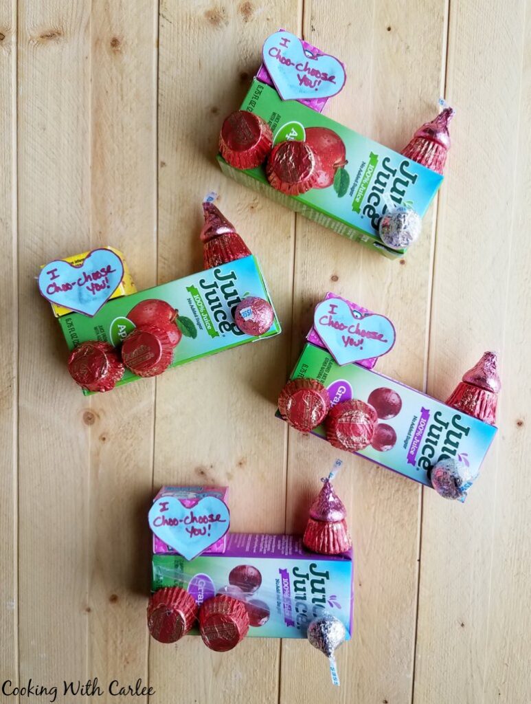 Valentines trains made out of juice boxes and candy.