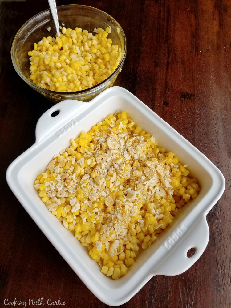 square casserole layered with corn and crackers, putting together old fashioned scalloped corn recipe