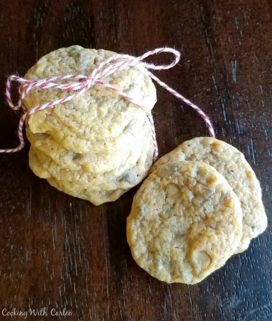Stack of butterscotch toffee cookies tied with baker's twine.