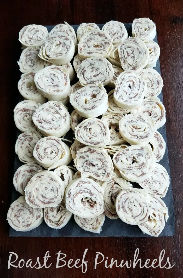 Perfectly easy finger food that is made to be snacked on, these 4 ingredient roast beef pinwheels are a great party starter!