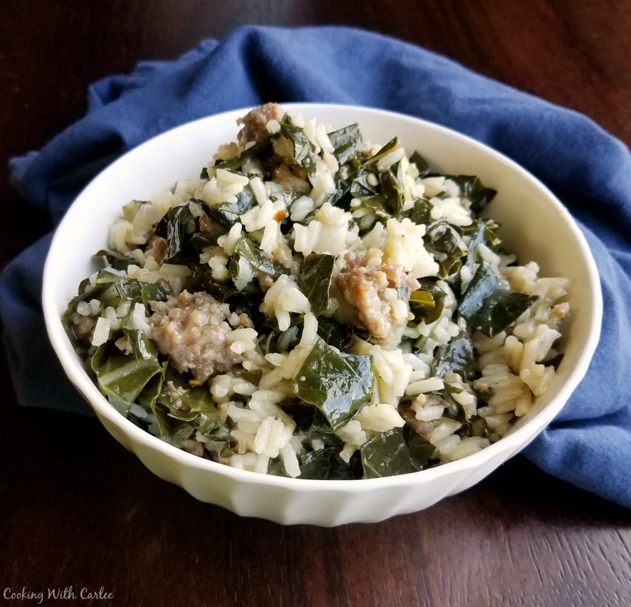 bowl of one pan collard greens with rice and sausage, ready to eat.