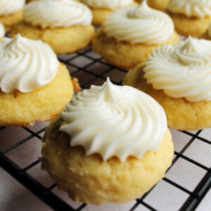 Sour cream cookies topped with swirls of perfect not too sweet buttercream.