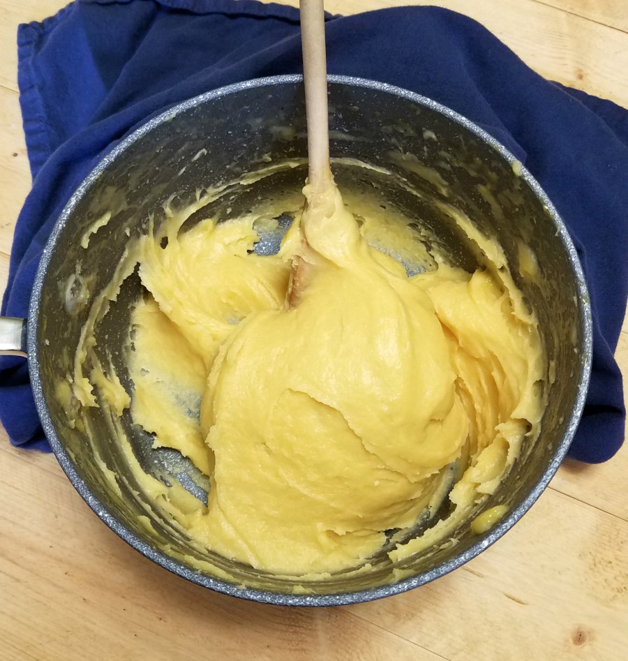 choux dough in saucepan.