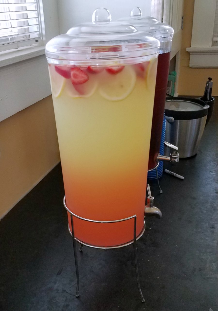 Big beverage dispenser of strawberry lemonade