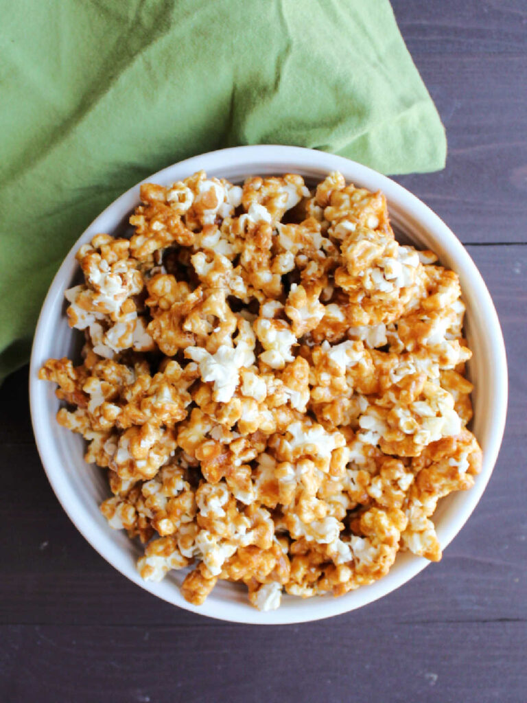 Crunchy Peanut Butter Popcorn 6 Looking down on a bowl of peanut butter caramel corn, ready to eat.
