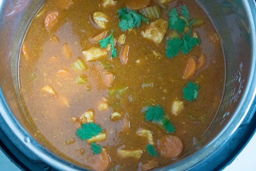 saucy curry inside electric pressure cooker.