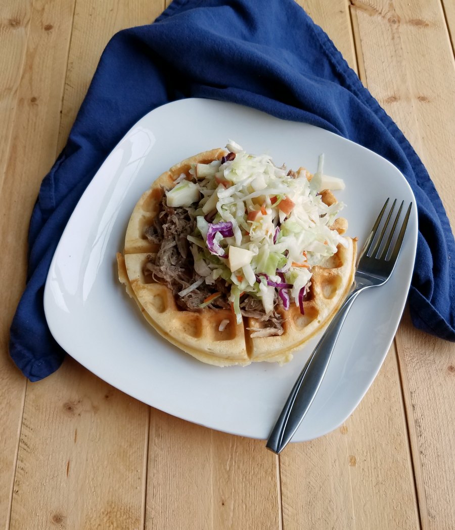 waffle with cider pulled pork and apple slaw