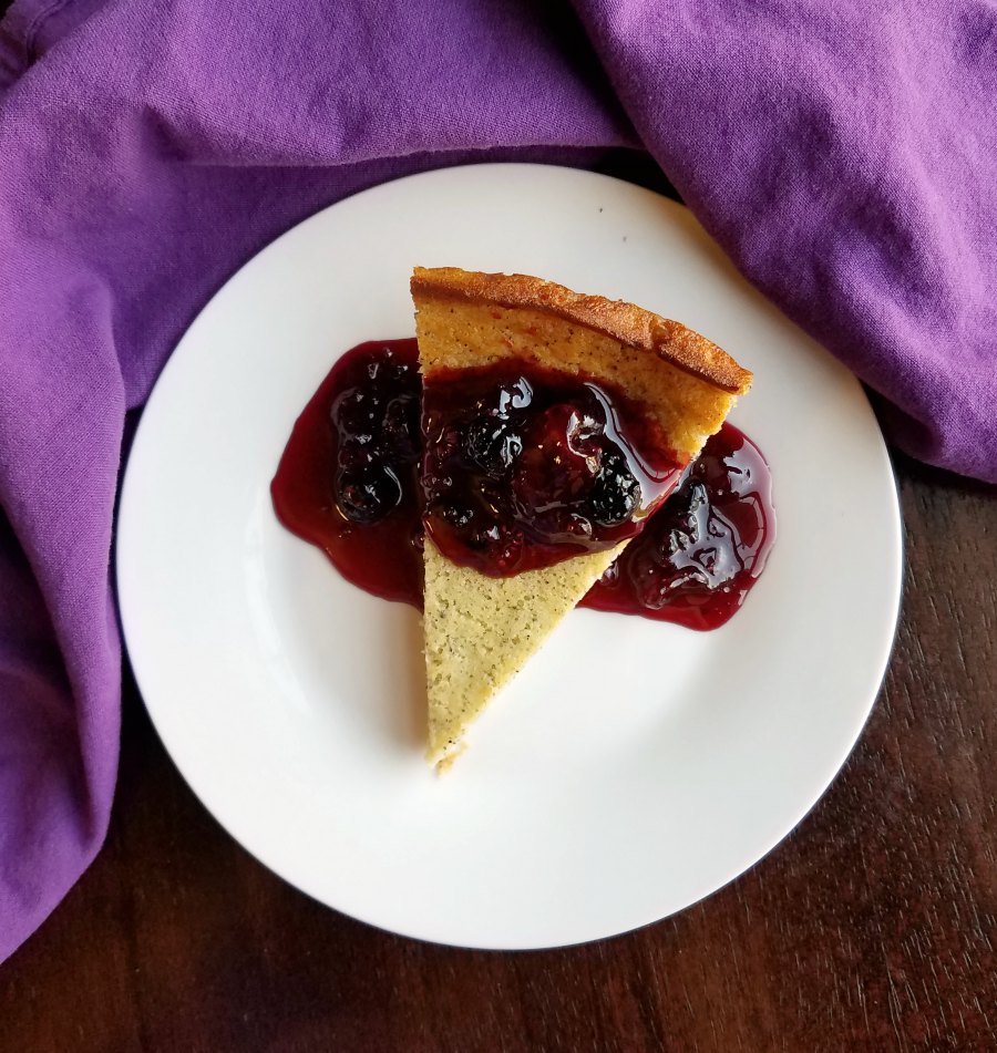 slice of dragonfruit pie with berry sauce