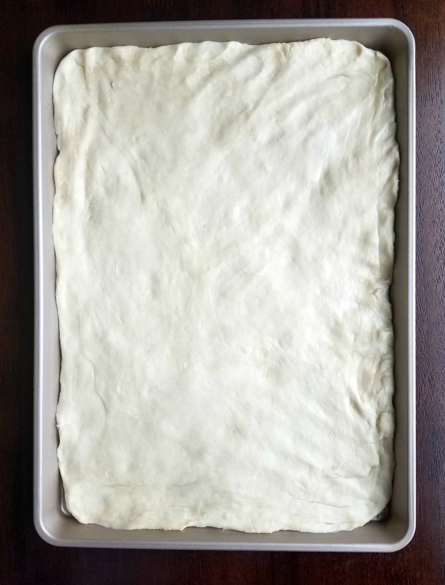 dough pressed into sheet pan.