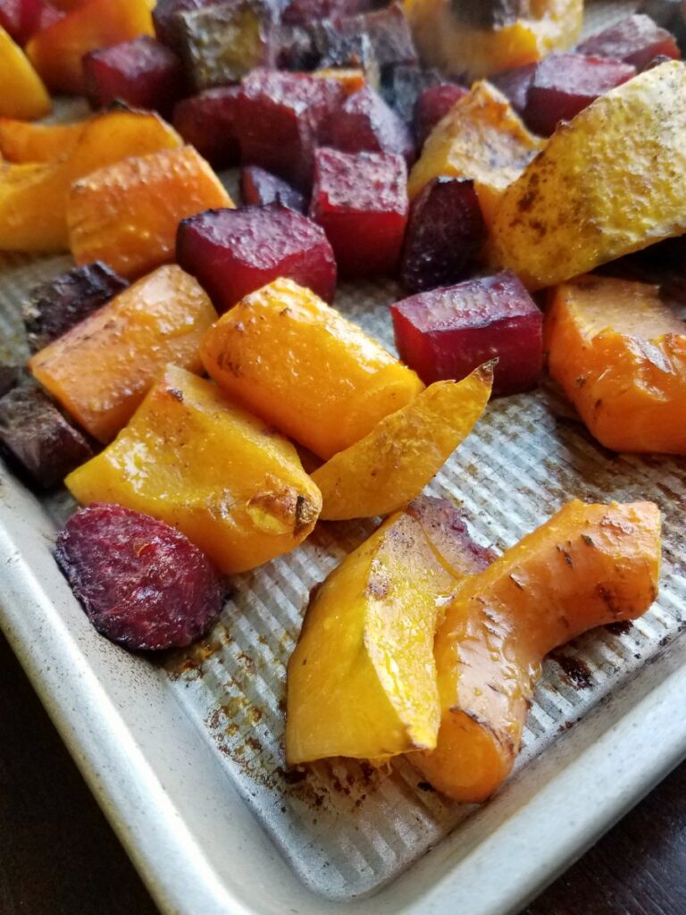 pan of roasted squash and root vegetables with five spice. 