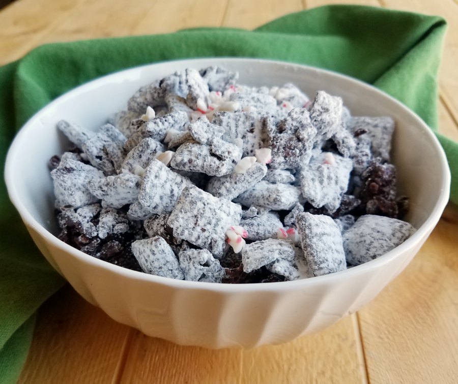 bowl of puppy chow with bits of candy cane mixed in