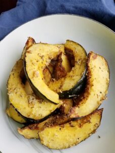 Pile of Parmesan roasted acorn squash ready to eat.