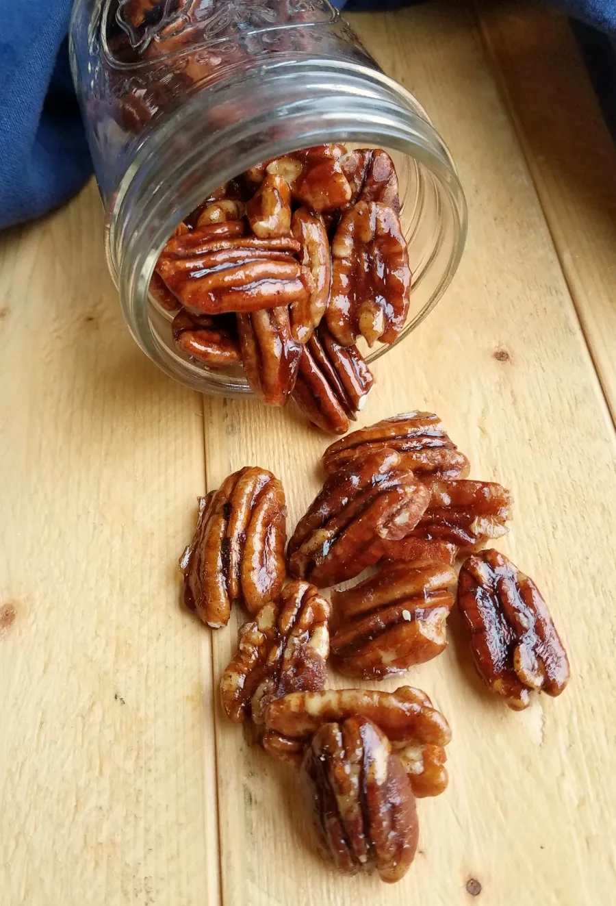 bowl of pecans with crunchy caramel coating.