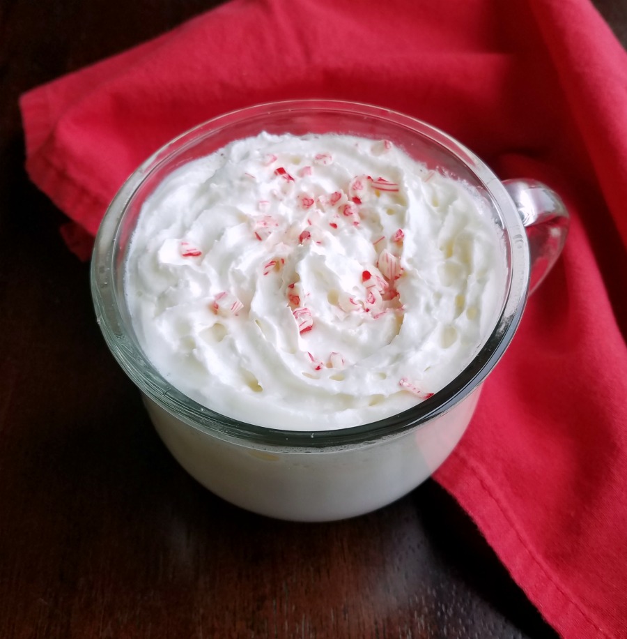 whipped cream topped peppermint white hot chocolate.