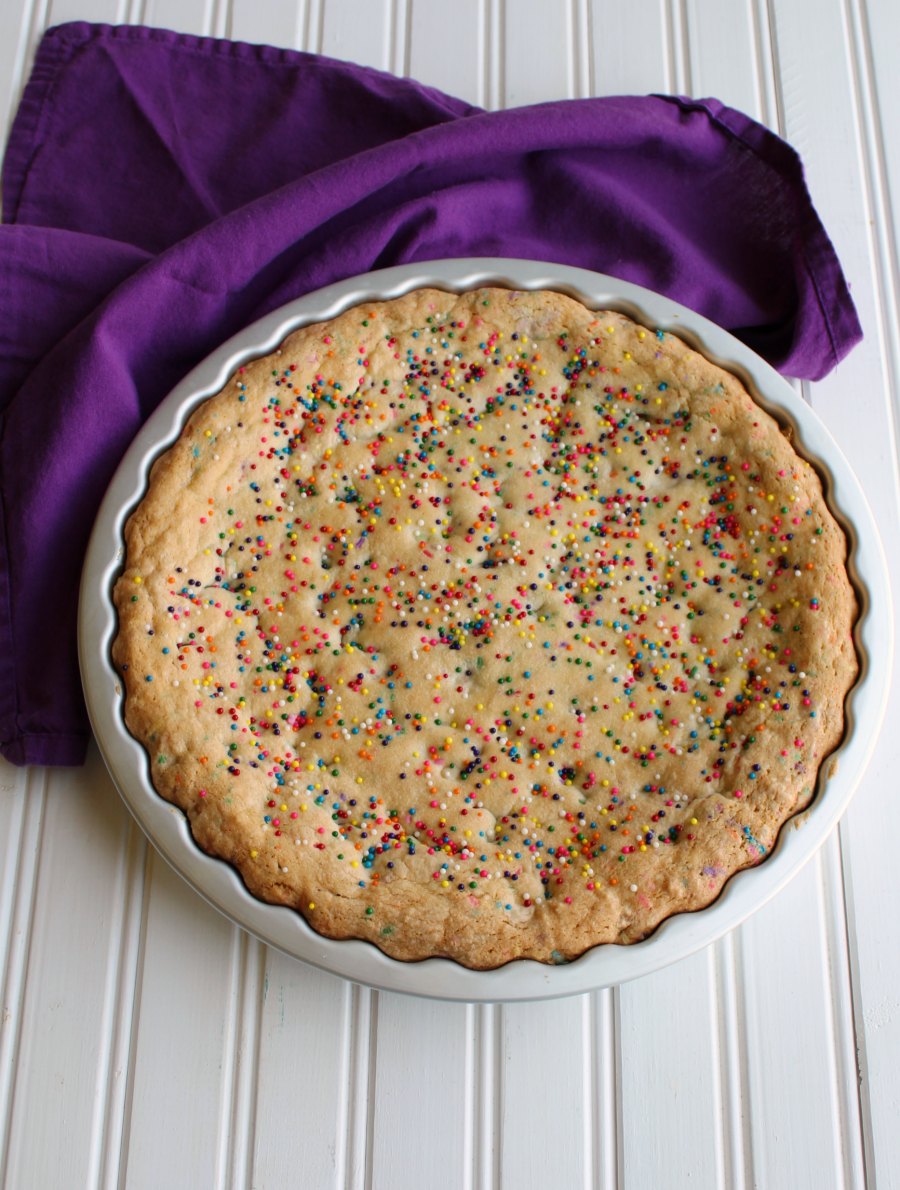 baked cookie with tons of sprinkles on top.