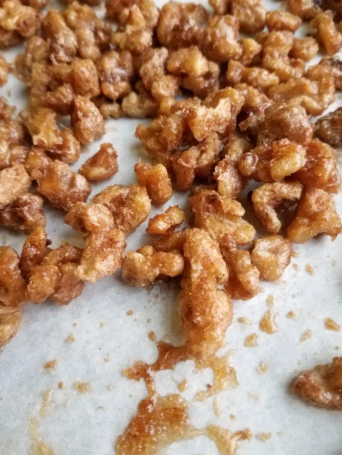 candied nuts on baking sheet fresh from the oven.