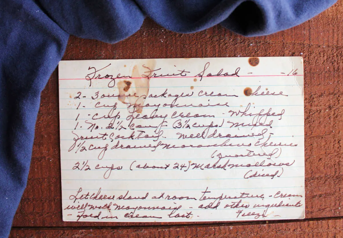 Great grandma's hand written recipe card for frozen fruit salad.