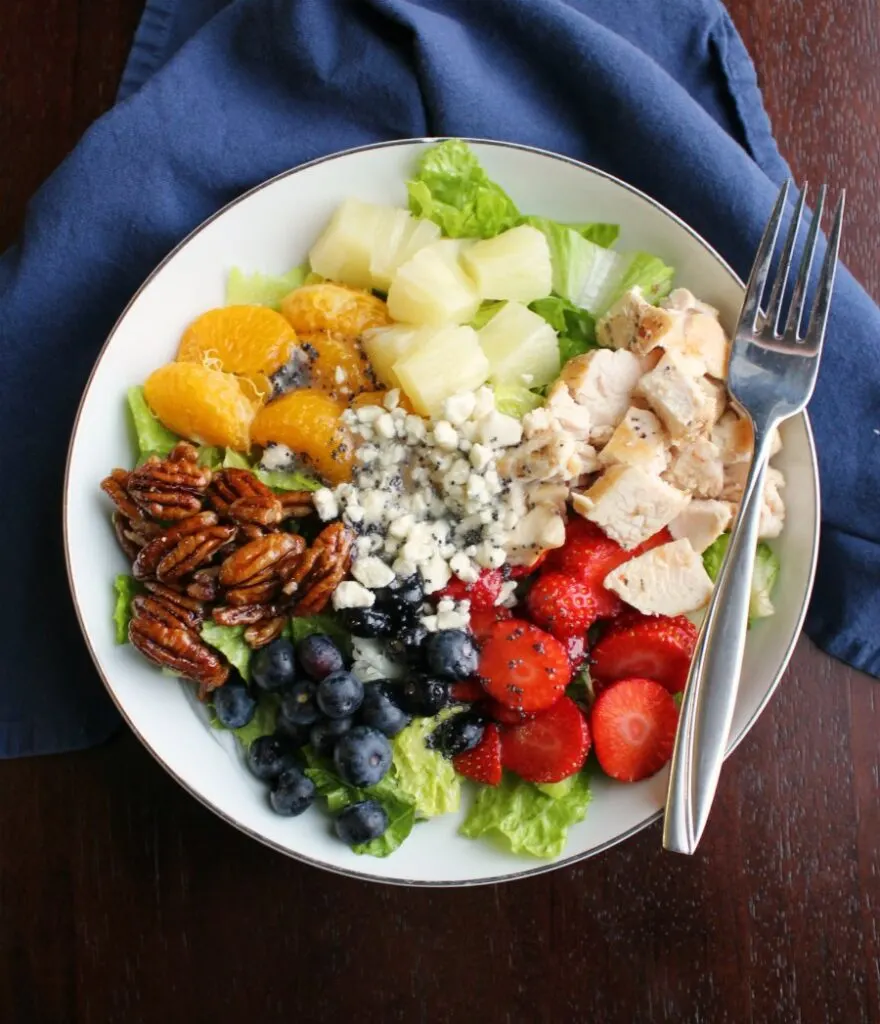 Portillos copycat fruit and chicken salad drizzled with homemade poppy seed dressing.