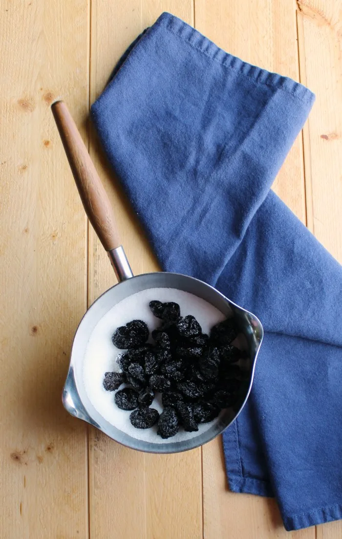 sugar and dried cherries in small saucepan to make cherry syrup.