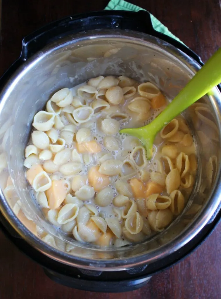 cooked pasta with cheese and milk in instant pot.