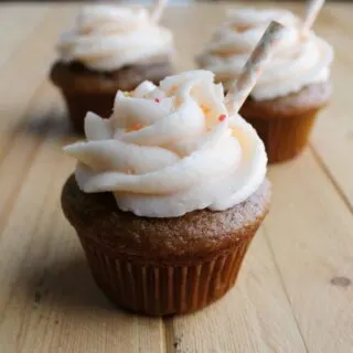 Sweet tea cupcakes with peach buttercream and paper straw decorations.
