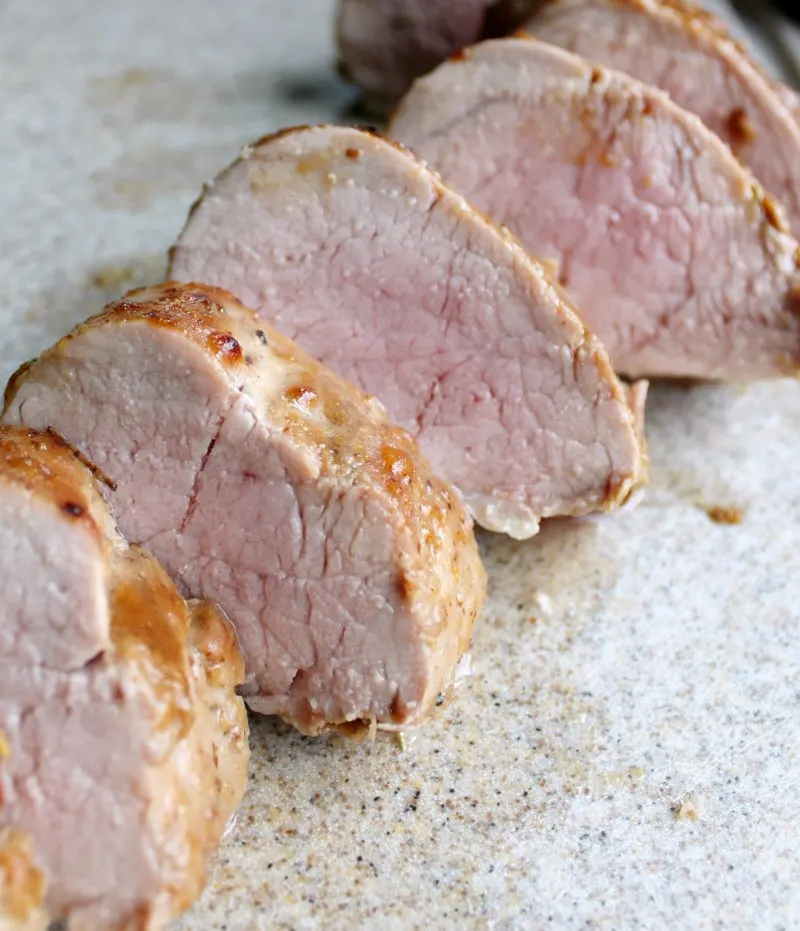slices of tenderloin with blush of pink in the center, ready to eat.